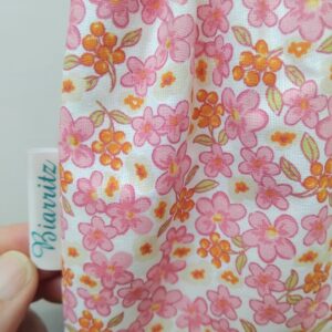 Pochette brosse à dents imperméable en coton Oeko Tex motifs fleuris rose.