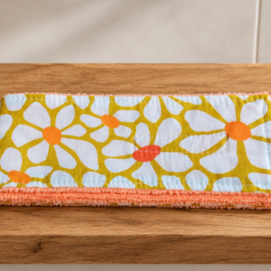 Bandeau de visage en éponge de bambou mandarine et coton fleuri.